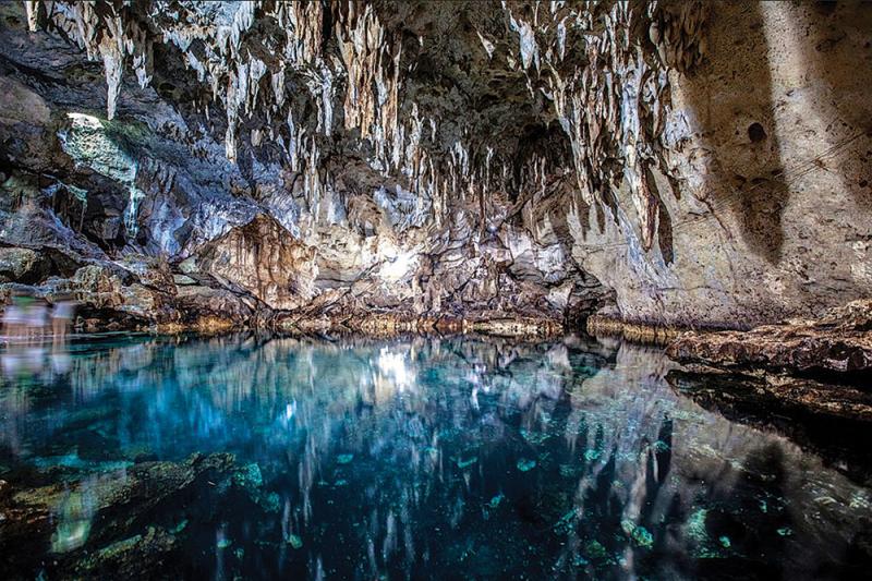 hinagdanan cave on panglao island is a naturally lighted cave thanks to the holes in the ceilings hinagdanan which means laddered in cebuano is home to a deep lagoon as well as many stalactities and stalagmites